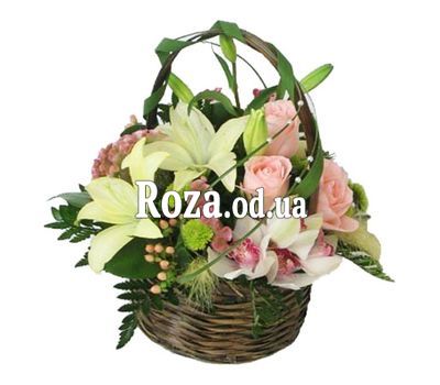 Basket of flowers from orchids and roses