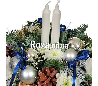 Christmas composition in a box with candles 1