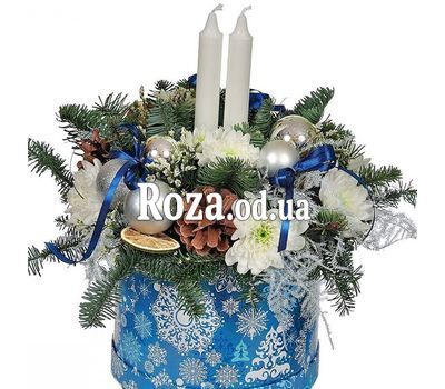 Christmas composition in a box with candles